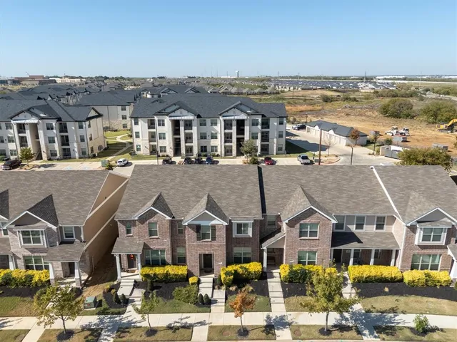 an aerial view of multiple houses