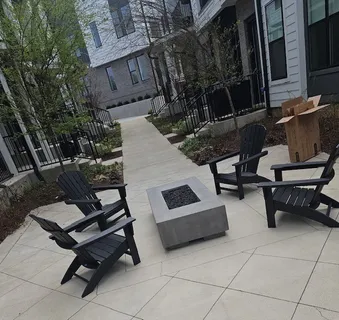 a view of backyard with outdoor seating