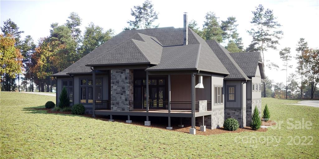 860 Daniel Cir Drive, Unit 89 Mills River, NC 28759 - Photo 3 of 5 a front view of a house with a yard