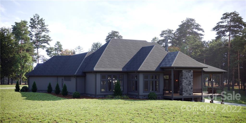 860 Daniel Cir Drive, Unit 89 Mills River, NC 28759 - Photo 4 of 5 a front view of a house with a yard