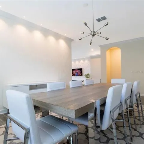 a view of a dining room with furniture