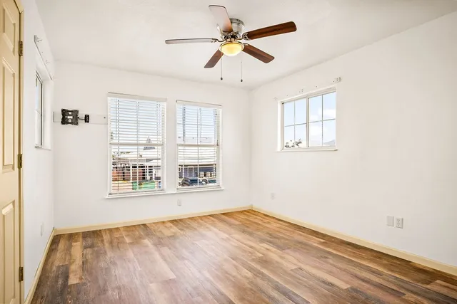 a view of an empty room with a window