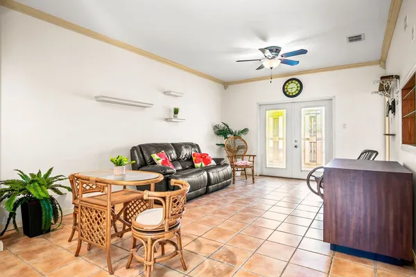 a living room with furniture and window