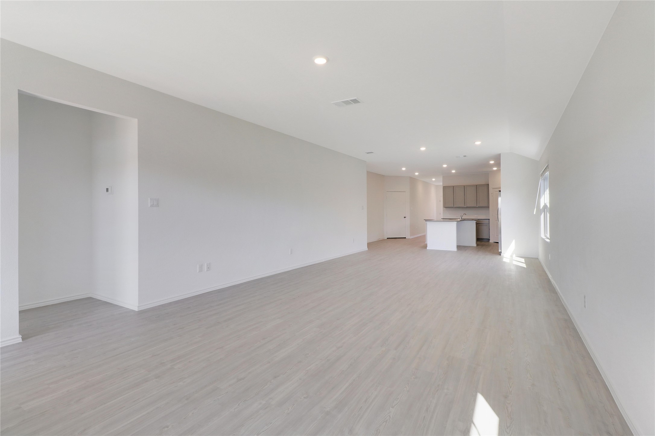 2524 Four Waters Loop Georgetown, TX 78628 - Photo 6 of 36 a view of empty room with wooden floor