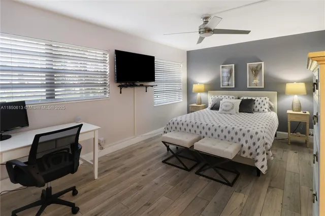 a kitchen with a sink and a stove top oven