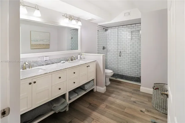 a view of a park with trees and grass