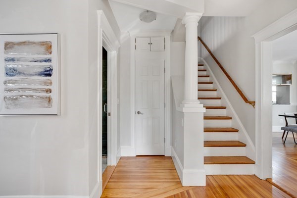 37 Bromfield Road Somerville, MA 02144 - Photo 18 of 39 a view of a hallway with wooden floor and entryway