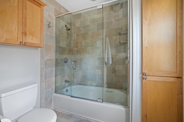 37 Bromfield Road Somerville, MA 02144 - Photo 24 of 39 a bathroom with a bathtub and a shower