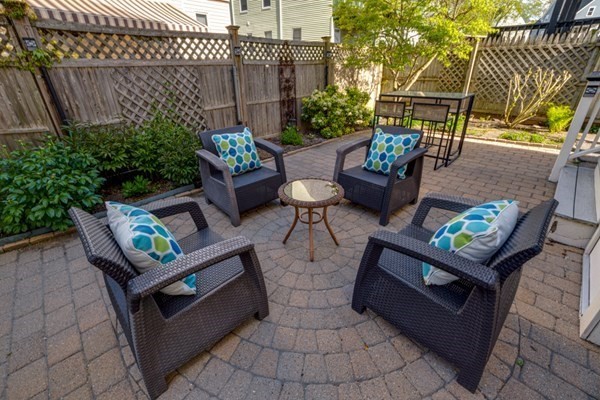 37 Bromfield Road Somerville, MA 02144 - Photo 34 of 39 a view of a patio with couches and potted plants