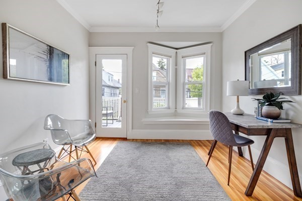 37 Bromfield Road Somerville, MA 02144 - Photo 5 of 39 a living room with furniture a window and a potted plant