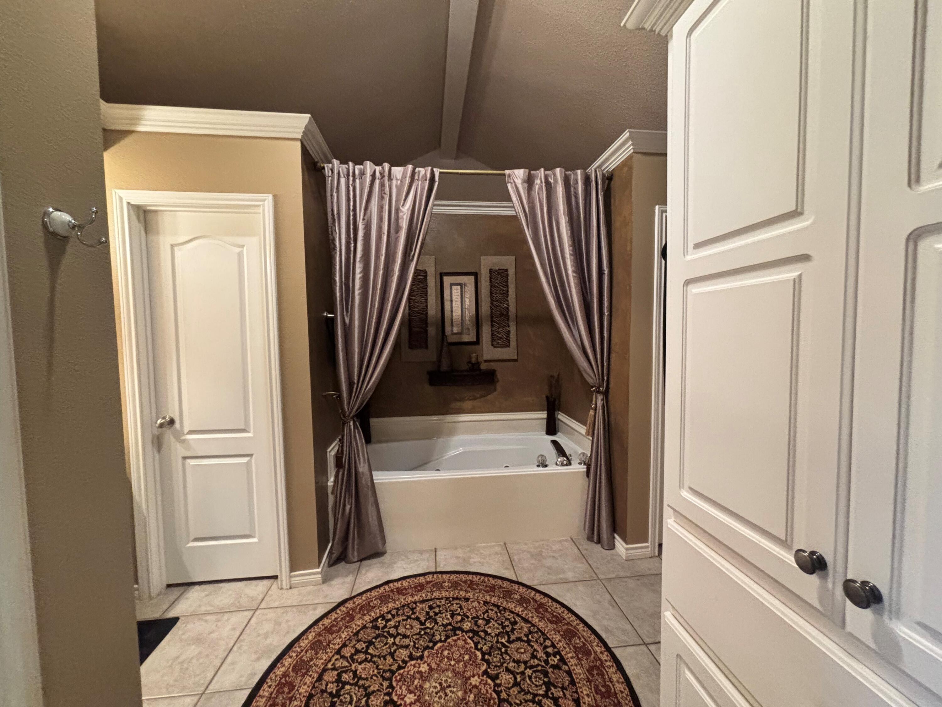 3713 106th Street Lubbock, TX 79423 - Photo 9 of 22 a view of washer and dryer