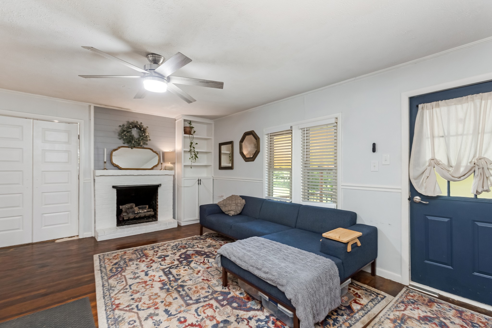 130 McFarlin Road White Bluff, TN 37130 - Photo 4 of 33 a living room with furniture and a fireplace