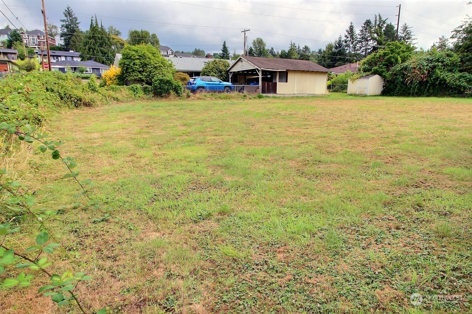 3619 Talbot Road South Renton, WA 98055 - Photo 2 of 27 a front view of house with yard