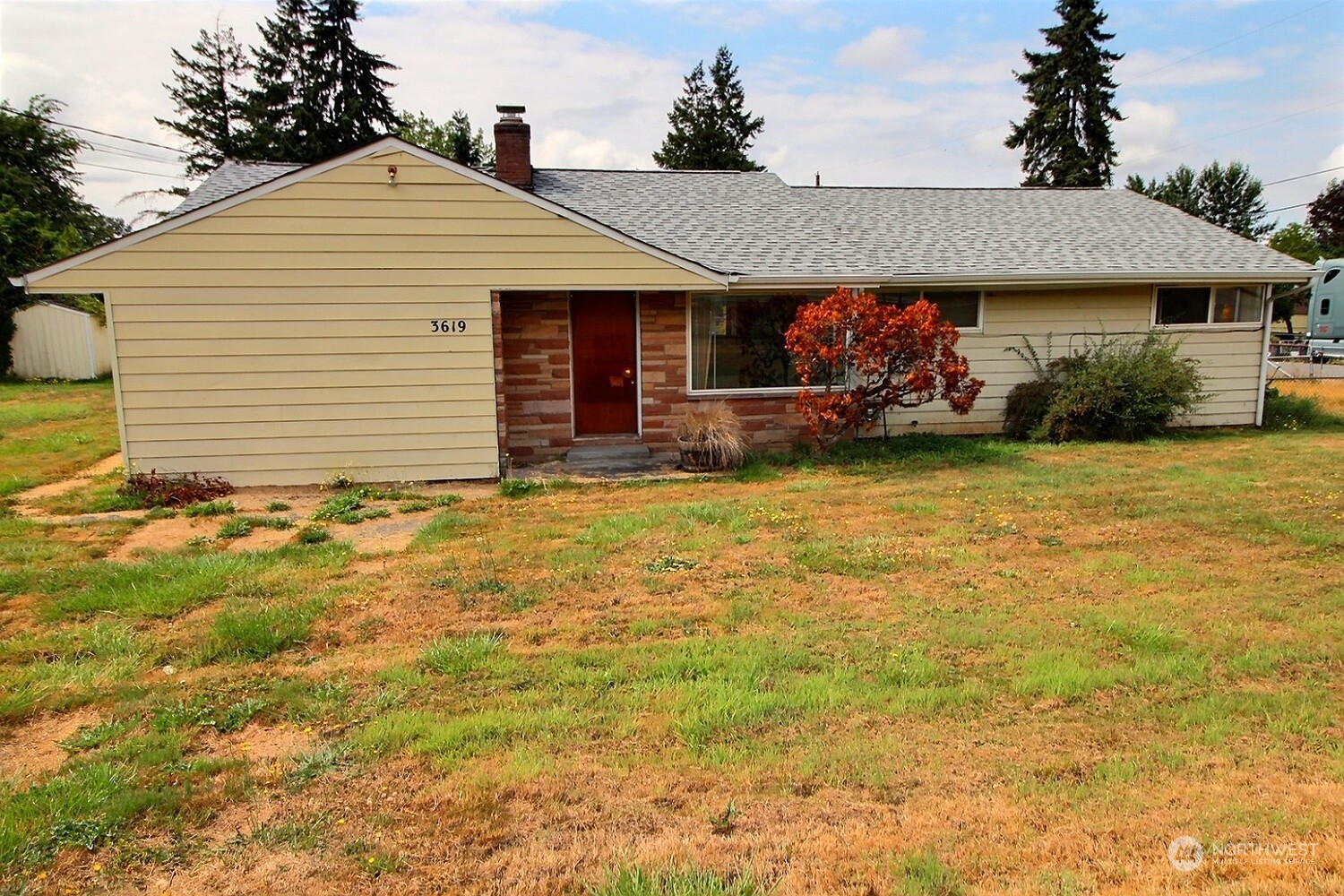 3619 Talbot Road South Renton, WA 98055 - Photo 21 of 27 a view of a house with garden