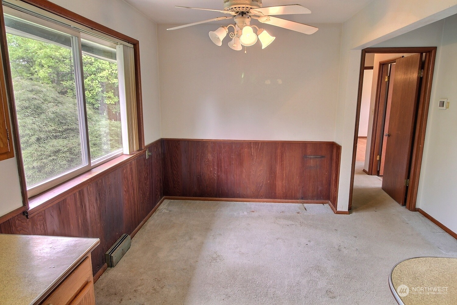 3619 Talbot Road South Renton, WA 98055 - Photo 9 of 27 an empty room with windows