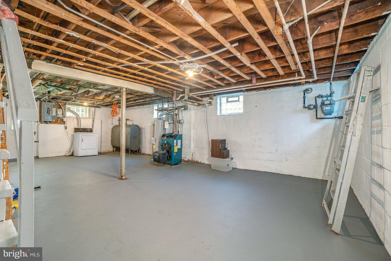 516 Random Road Baltimore, MD 21229 - Photo 22 of 31 Clean unfinished basement