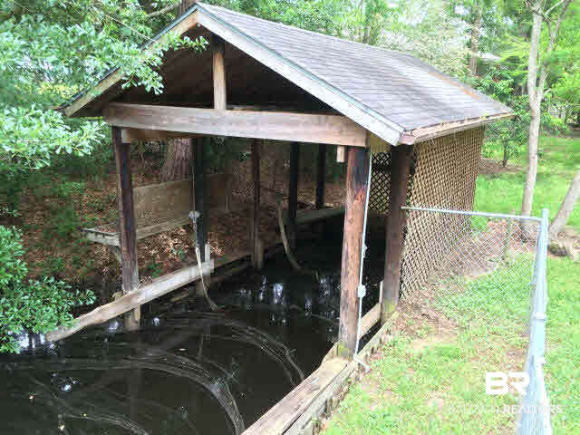 3961 Victoria Drive Theodore, AL 36582 - Photo 21 of 25 covered parking for your boat with a boat lift