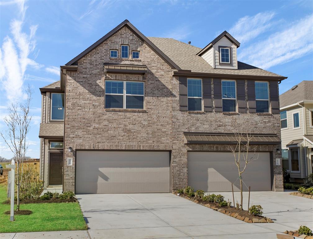Charming new construction town-home available in Sienna Plantation.  This never-lived-in home is stunning inside and out.  There are no back neighbors to this property!