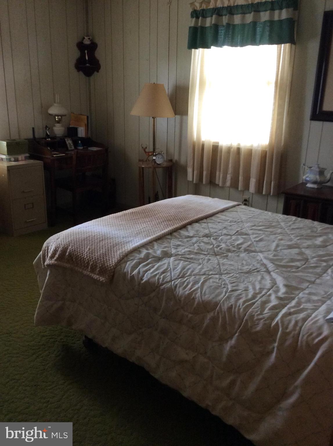 2001 Stulltown Road Millington, MD 21651 - Photo 18 of 18 a bedroom with a bed and a window