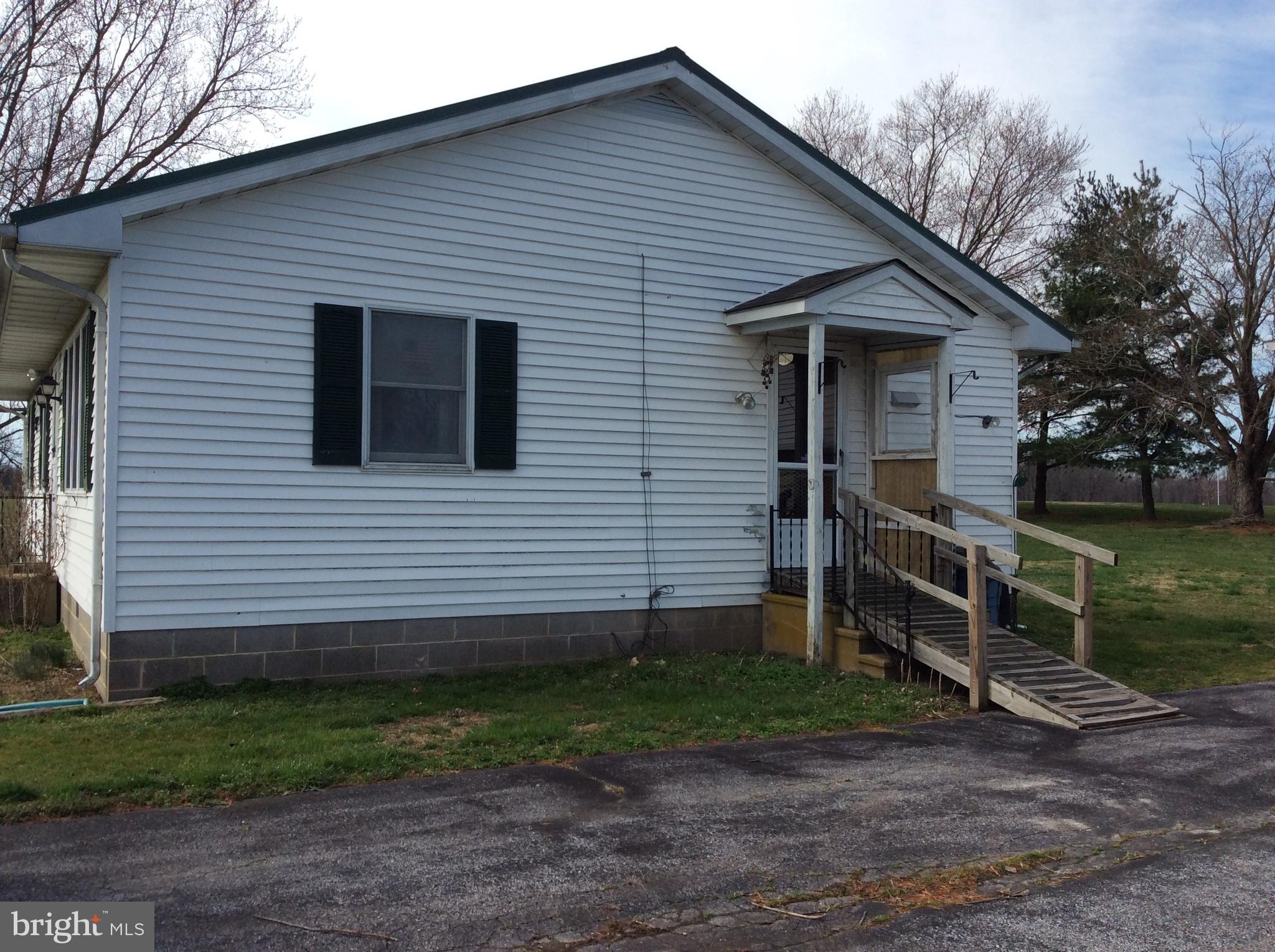 2001 Stulltown Road Millington, MD 21651 - Photo 2 of 18 a front view of a house with garden