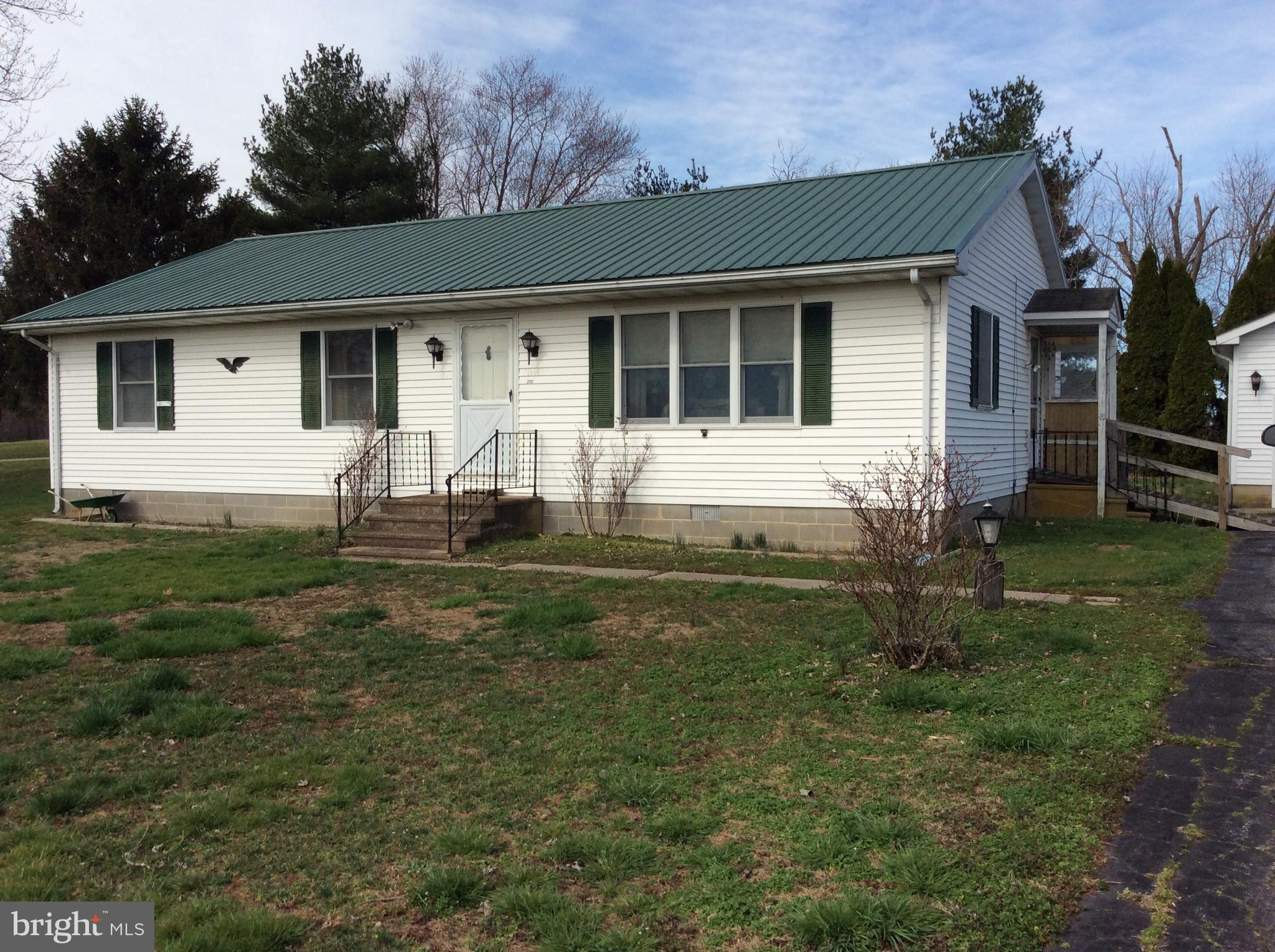 2001 Stulltown Road Millington, MD 21651 - Photo 4 of 18 a front view of house with yard