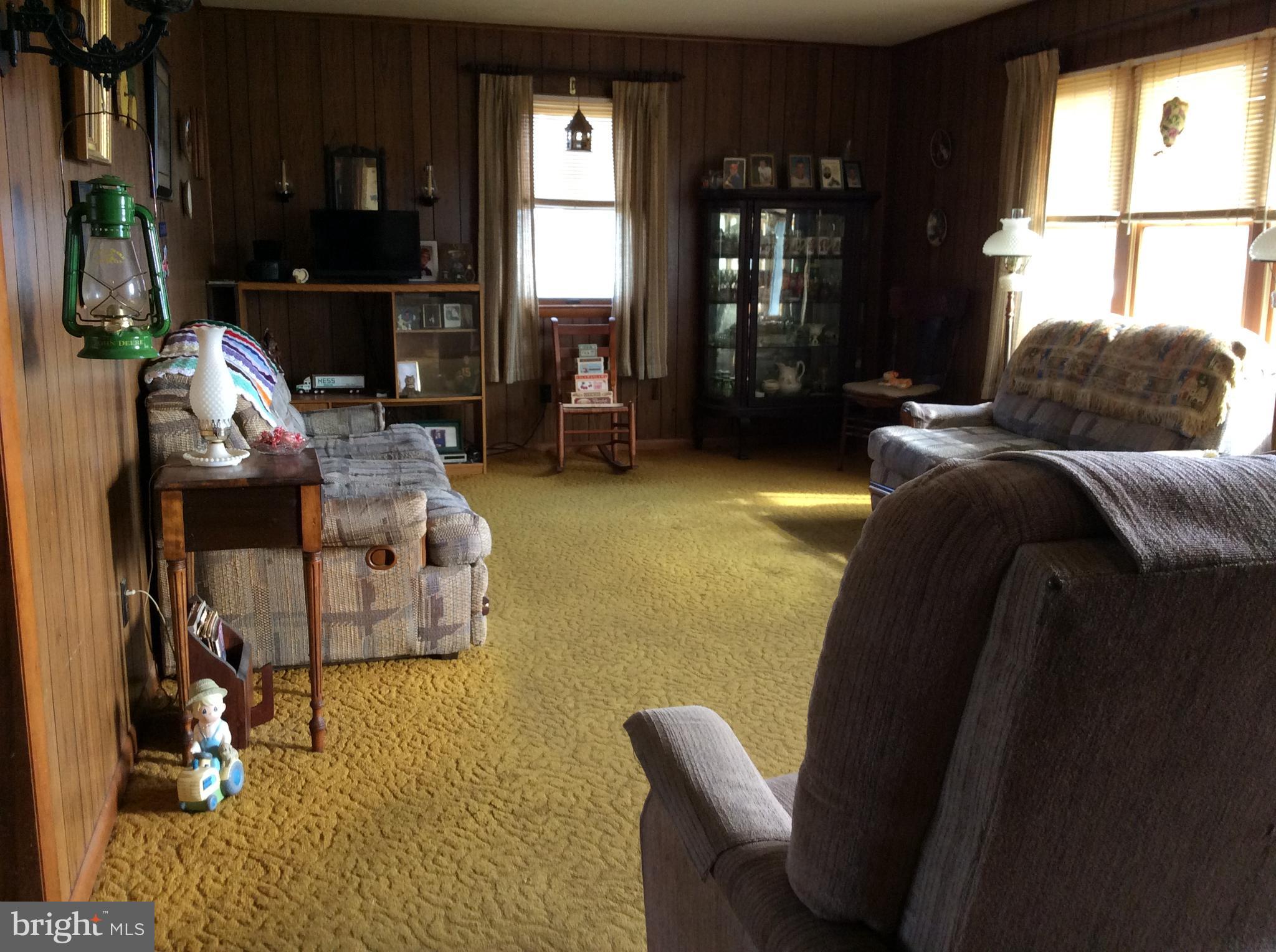 2001 Stulltown Road Millington, MD 21651 - Photo 9 of 18 a living room with furniture rug and window