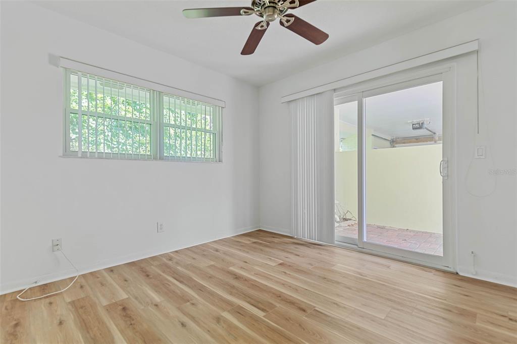 9 Crompton Place Palm Coast, FL 32137 - Photo 21 of 52 a view of empty room with ceiling fan and window