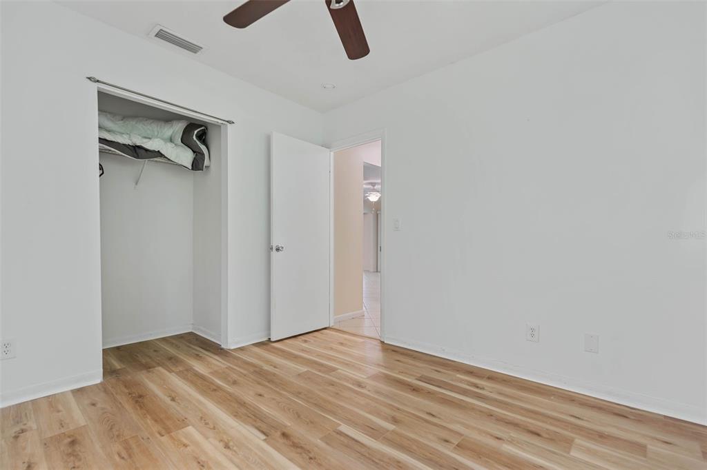 9 Crompton Place Palm Coast, FL 32137 - Photo 22 of 52 a view of empty room with wooden floor