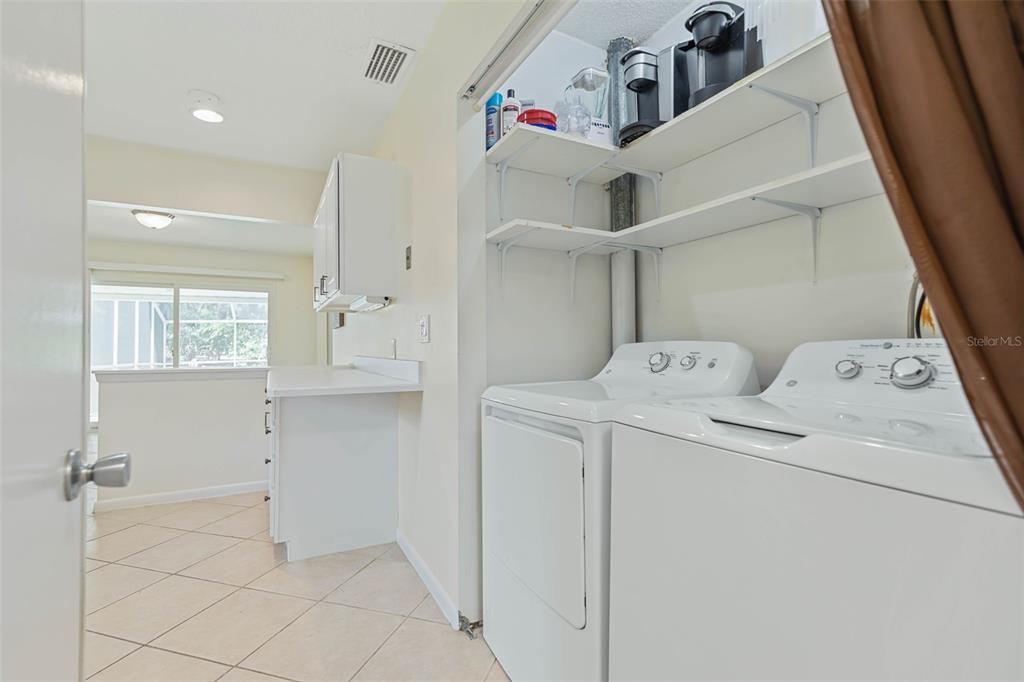 9 Crompton Place Palm Coast, FL 32137 - Photo 28 of 52 a utility room with dryer and washer