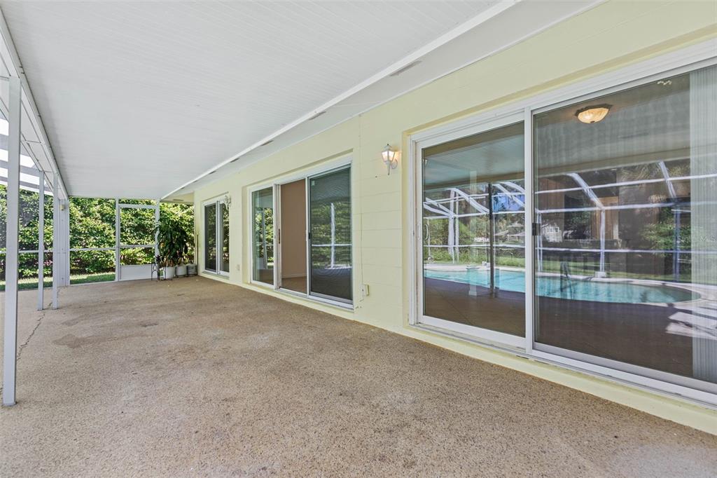 9 Crompton Place Palm Coast, FL 32137 - Photo 37 of 52 a view of an empty room with windows