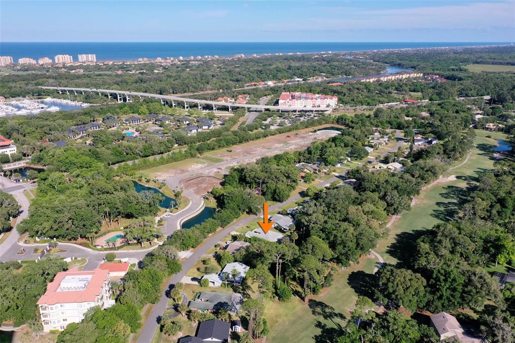 9 Crompton Place Palm Coast, FL 32137 - Photo 50 of 52 an aerial view of city and lake