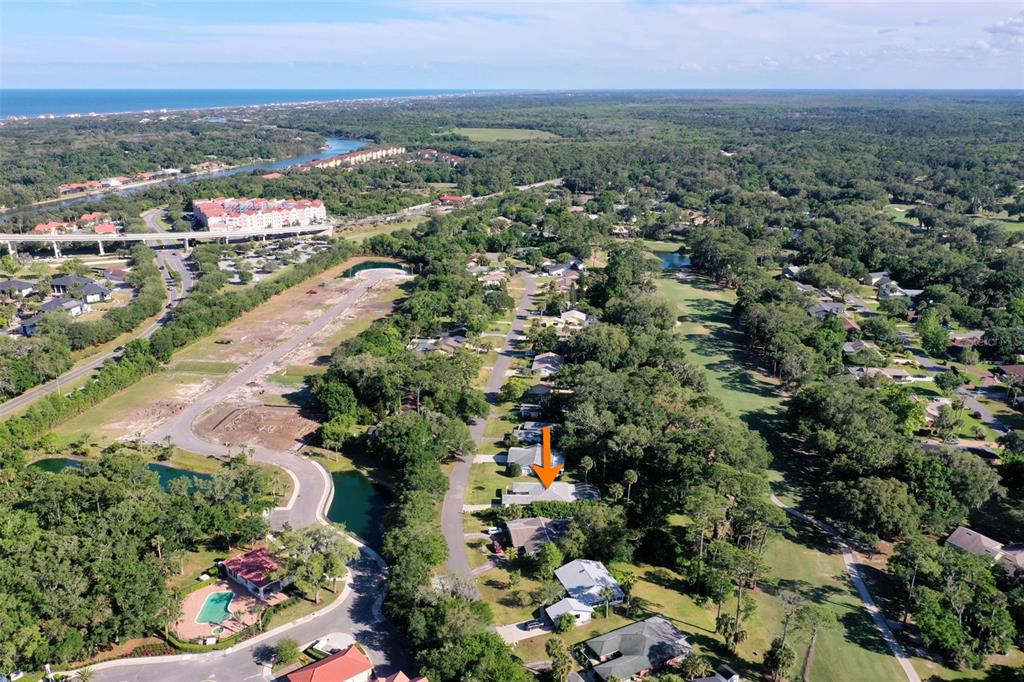 9 Crompton Place Palm Coast, FL 32137 - Photo 51 of 52 an aerial view of a city and mountain view in back