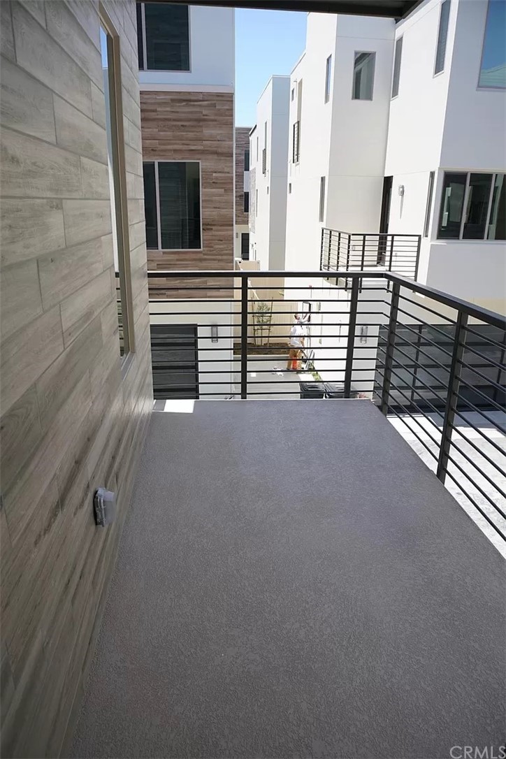 83 Ebb Tide Circle Newport Beach, CA 92663 - Photo 11 of 17 a view of an empty room with stairs