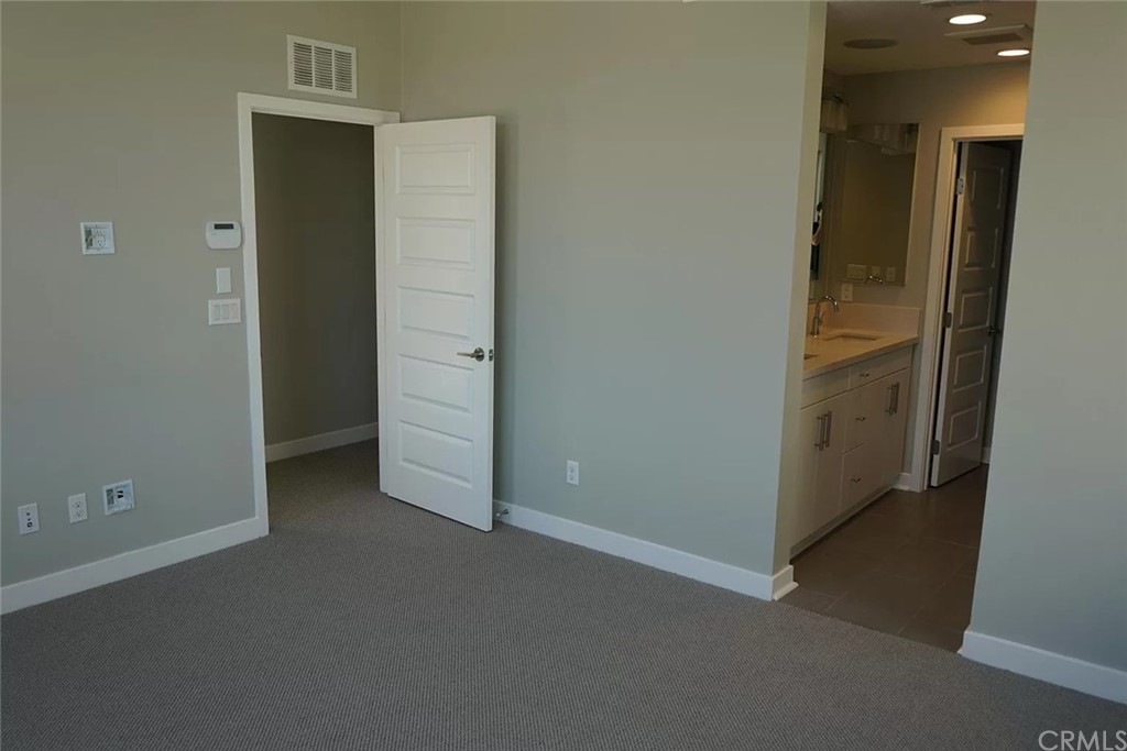 83 Ebb Tide Circle Newport Beach, CA 92663 - Photo 15 of 17 an empty room with closet