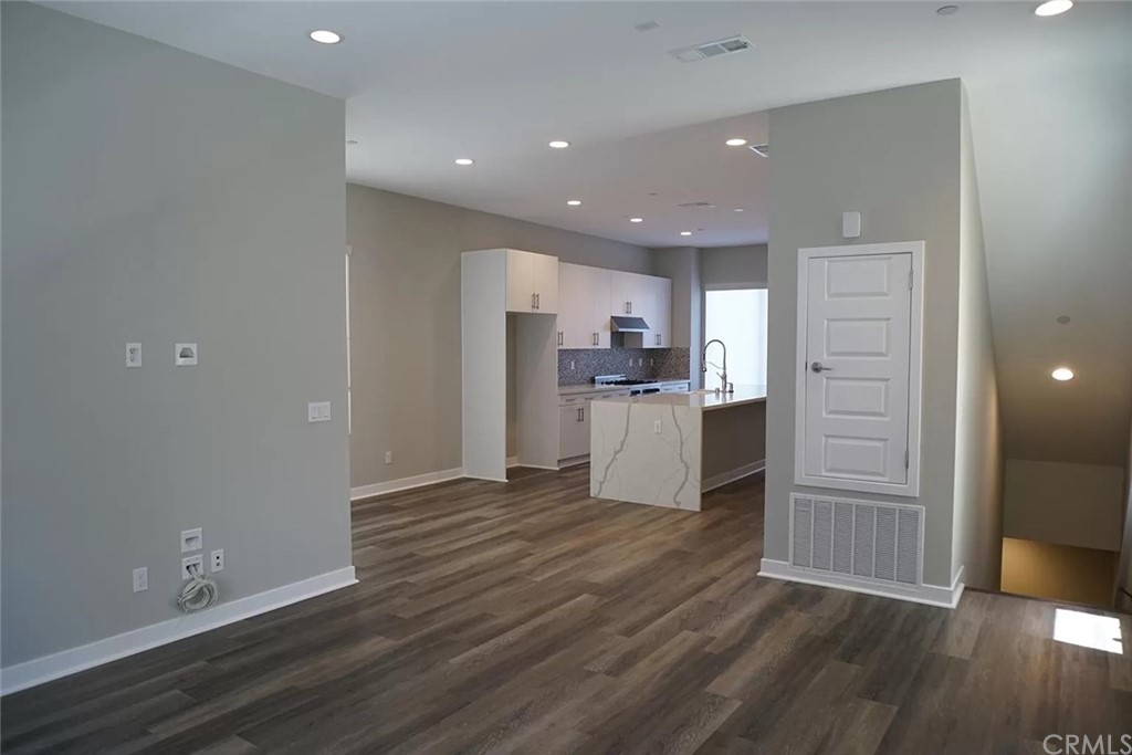 83 Ebb Tide Circle Newport Beach, CA 92663 - Photo 7 of 17 a view of kitchen with wooden floor