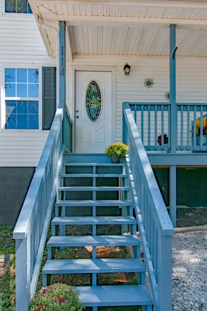 a view of entryway with a front door