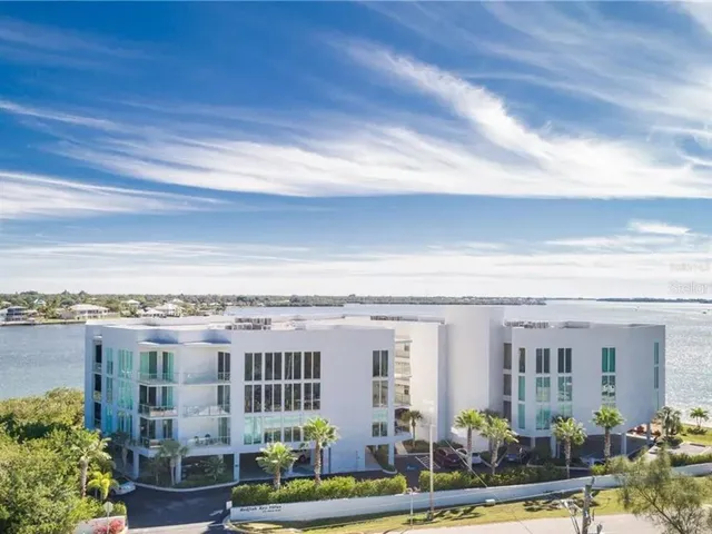 a view of a building with porch and outdoor space