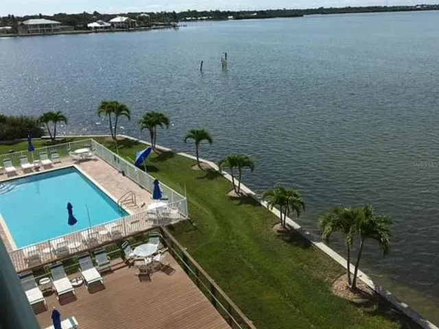 a view of a lake from a balcony