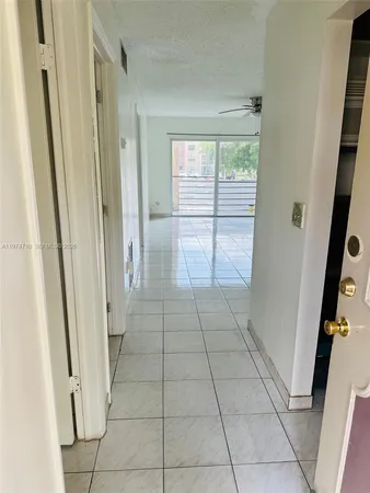 a bathroom with a sink a toilet and a bathtub