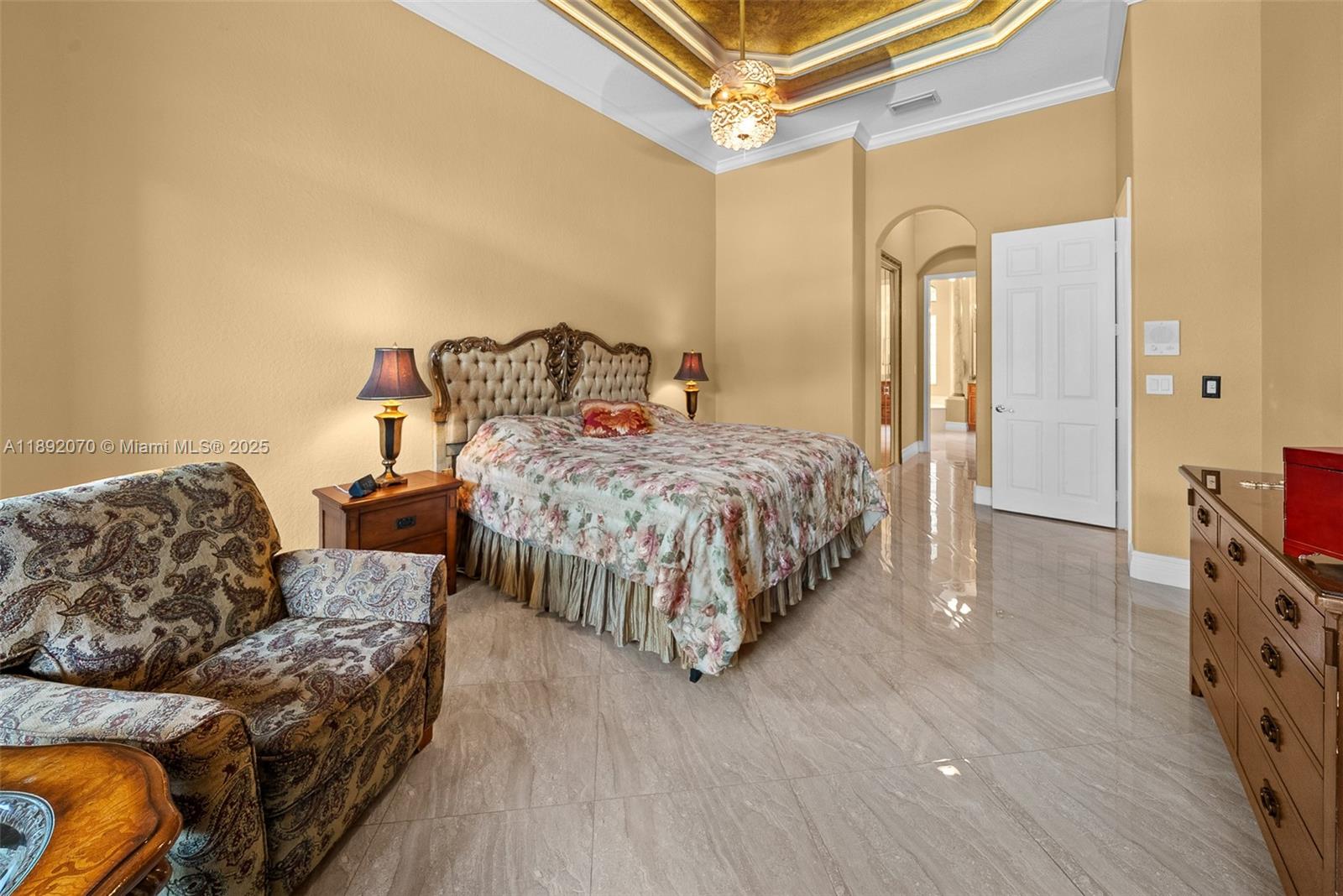 19230 Southwest 30th Street Miramar, FL 33029 - Photo 16 of 45 a bedroom with a bed and a dresser