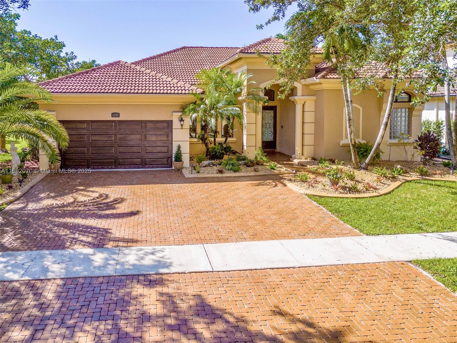 19230 Southwest 30th Street Miramar, FL 33029 - Photo 40 of 45 a front view of a house