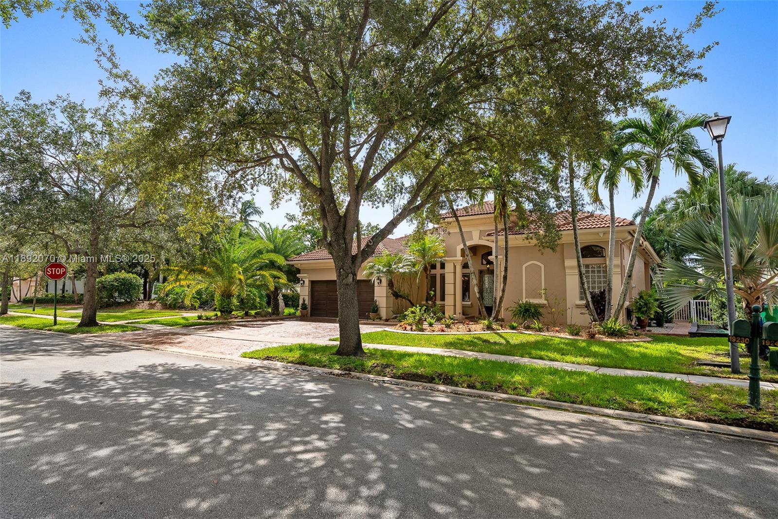 19230 Southwest 30th Street Miramar, FL 33029 - Photo 42 of 45 a front view of a building with trees