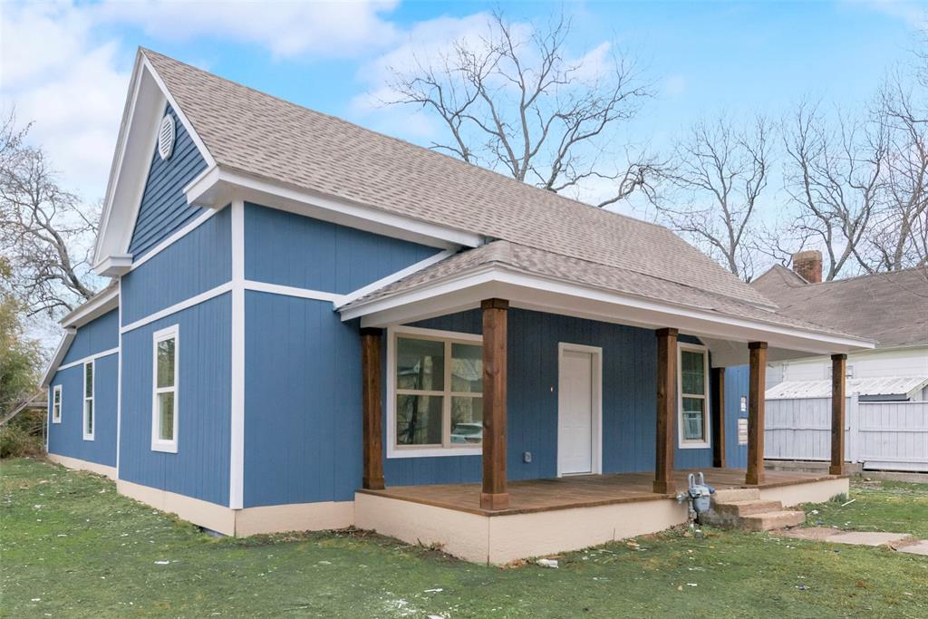 702 West 7th Street Bonham, TX 75418 - Photo 1 of 1 a view of a house with a yard