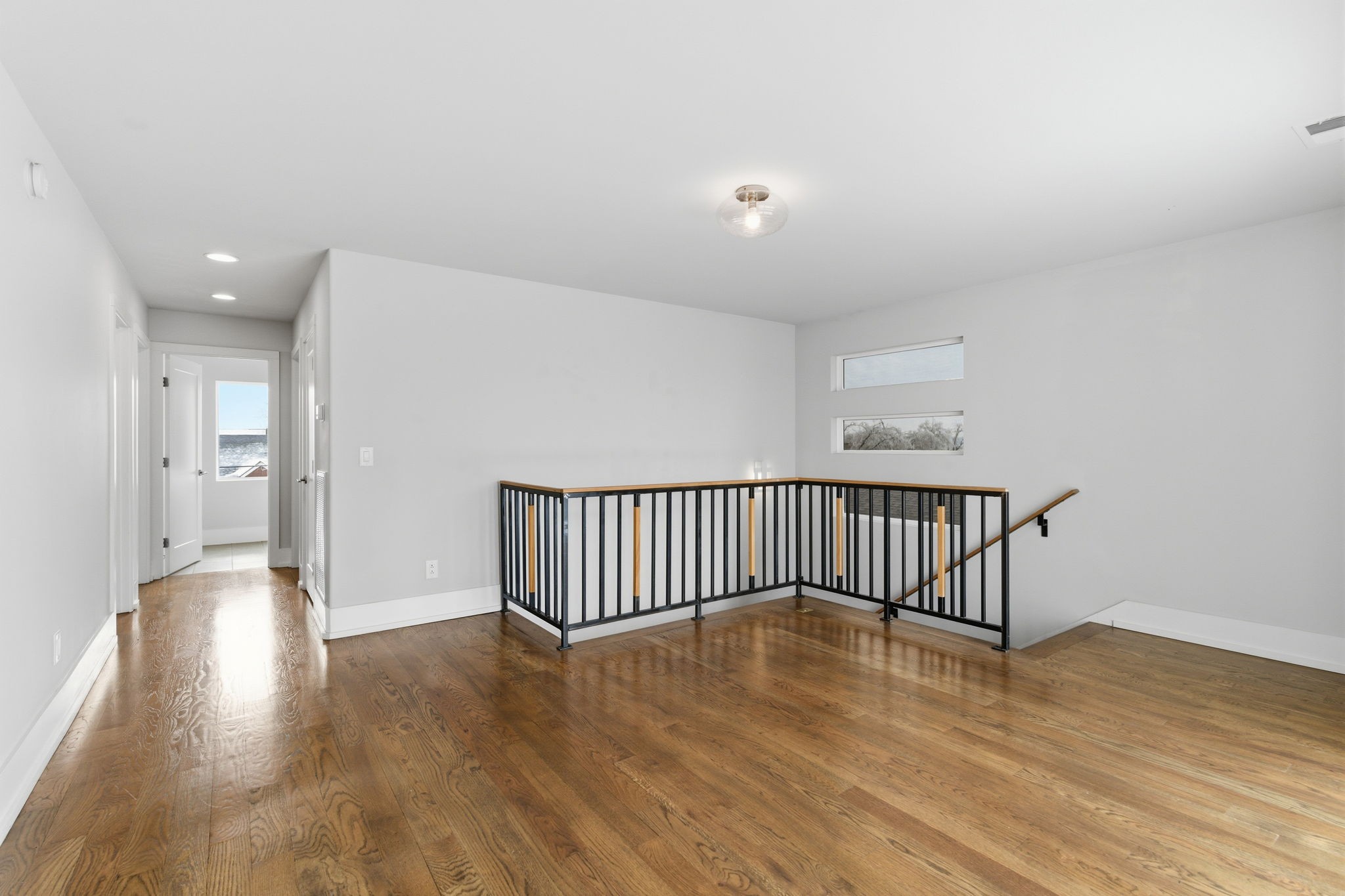 426 Patterson Street Nashville, TN 37211 - Photo 13 of 27 a view of a hallway with wooden floor