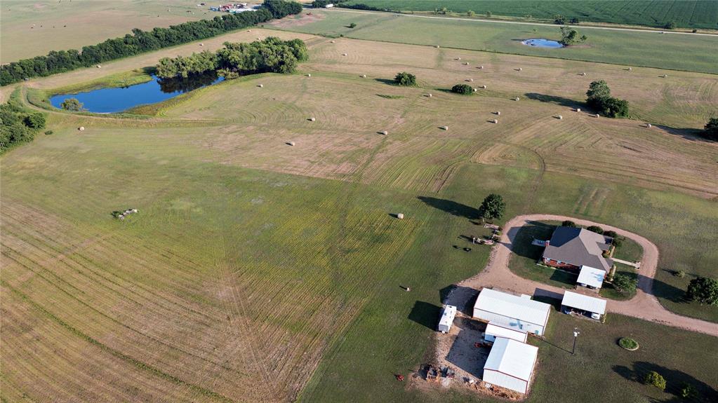 2424 Fm 3297 Ector, TX 75439 - Photo 29 of 38 North drone elevation