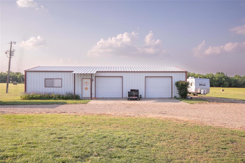 2424 Fm 3297 Ector, TX 75439 - Photo 35 of 38 Workshop & two car garage, boat storage, safe
