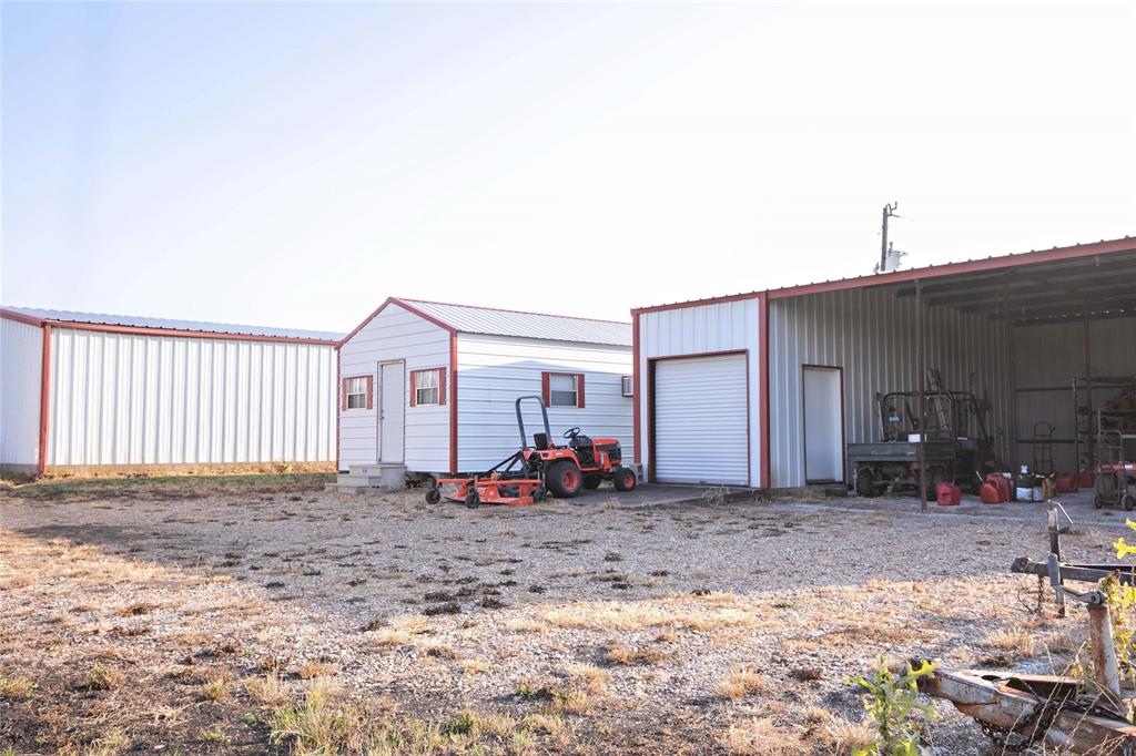 2424 Fm 3297 Ector, TX 75439 - Photo 37 of 38 East elevation of workshop, office and equipment barn