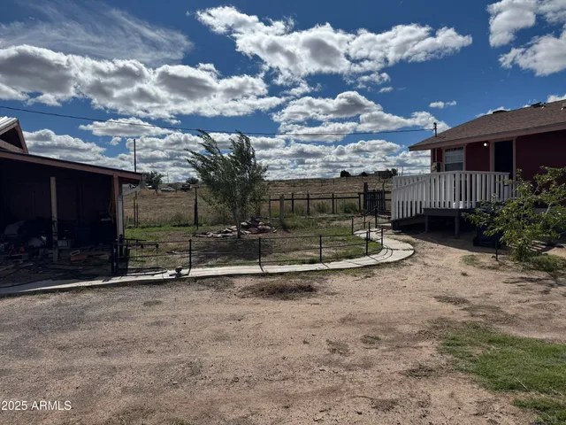 a view of car parked in front of house