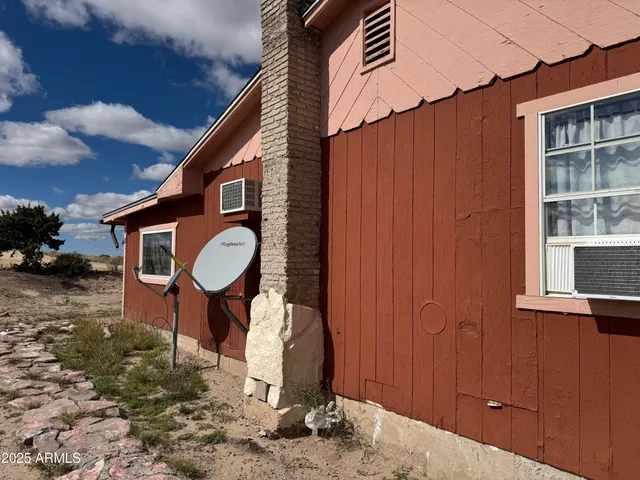 a view of a street with a building in the background