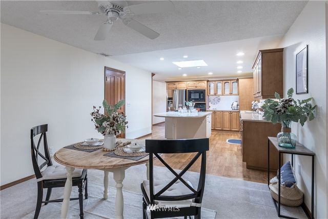 a view of a dining room with furniture